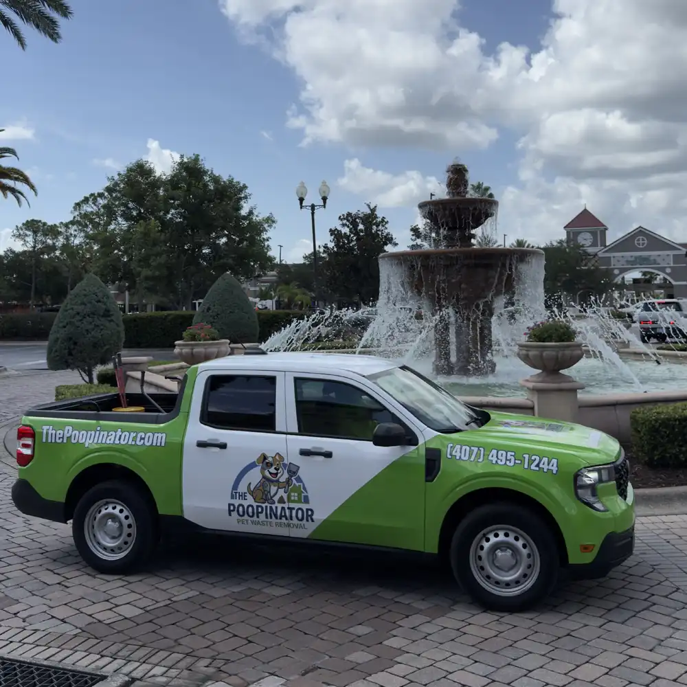 The Poopinator truck parked near a fountain in the Dr. Phillips, FL area.