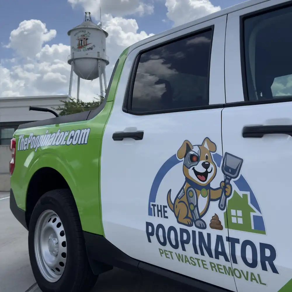 The Poopinator truck with the Winter Garden, FL water tower in the background.