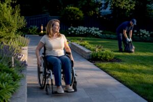 Wheelchair user enjoying a clean accessible yard